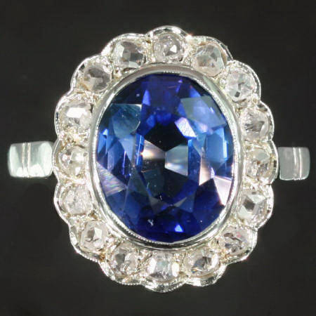 Glamourous sapphire and diamond engagement ring in the lady Di style